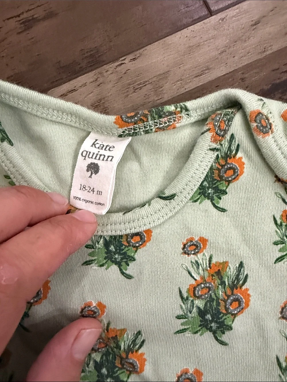 kate quinn Mint Green Baby Onesie with Orange Floral Sprays